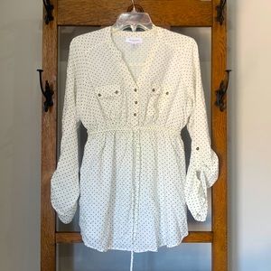 Motherhood maternity blouse in white with black polka dots. Gently worn
